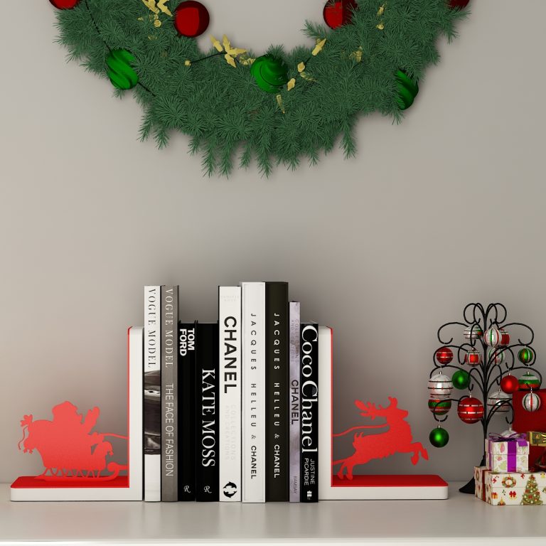 Sleighing Santa Bookends by Mohh