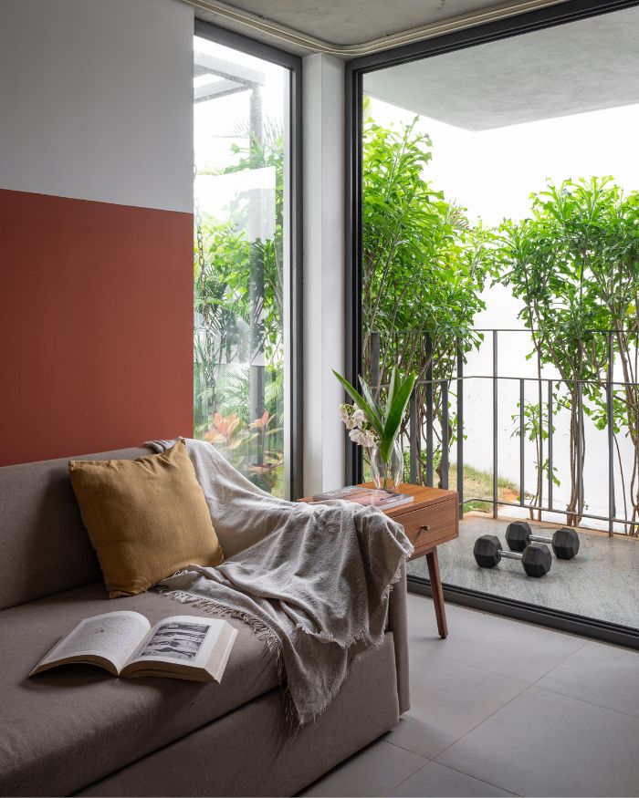 A snug corner where the outdoors meets indoors. The space features Kajaria tiles and knobs and door handles from Studio Made; Photography by Atik Bheda