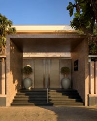 The entrance of the space uses ACP from VIVA and plants from Plant People; Photography by Talib Chitalwala