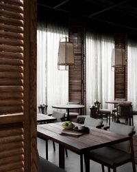 The flooring is made from Nexion tiles, the pendants hanging over the tables behind are from Mianzi, while furniture is from Project 810; Photography by Avesh Gaur
